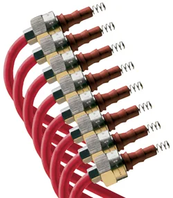 Six red ignition spark plug wires laid out diagonally, showing metal connectors at their ends.
